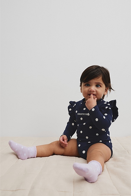 Organically Grown Cotton Blend Frill Long Sleeve Logo Bodysuit